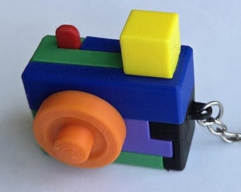 Camera Conundrum Plastic Keychain Puzzle with Solution Card and Hidden Drawer