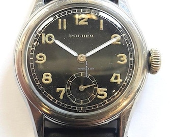 May include: A vintage wristwatch with a black face and gold numerals. The watch has a silver-colored case and a black leather band. The brand name "POLHEM" is visible on the watch face. A small seconds dial is located at the bottom of the watch face.