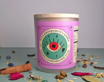 Vela de cristal de la prosperidad: infusión de ojo de tigre, jade y hierbas