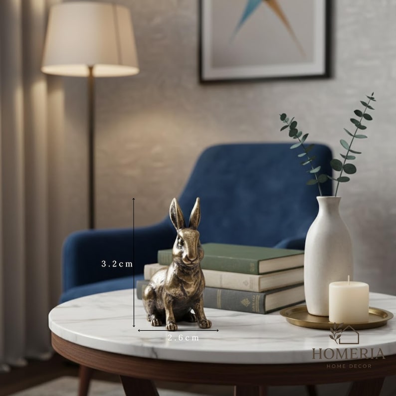 Small antique-style brass bunny statues arranged as symbolic lucky animal home decoration