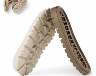 May include: Tan-colored boots with a textured sole, displayed with a close-up of the sole's tread pattern. The boots have a lace-up design and a neutral color palette, suitable for various outfits.