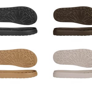 May include: Four different colored shoe soles and midsoles are displayed. The soles are black, brown, tan, and off-white. The soles have a textured pattern. The midsoles are the same colors as the soles. The image is on a white background.