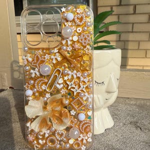 white and gold junk phone case