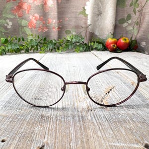 metallic brown tortoiseshell frames only unisex/men/women 1990s eyeglasses 90s deadstock vintage prescription glasses round cat-eye eyewear