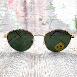 1990s round sunglasses solar-x glass lenses uv protection matte black or gold metal frames