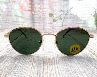 1990s round sunglasses solar-x glass lenses uv protection matte black or gold metal frames
