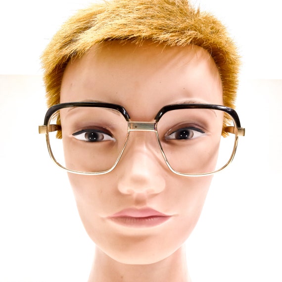 Browline glasses gold top