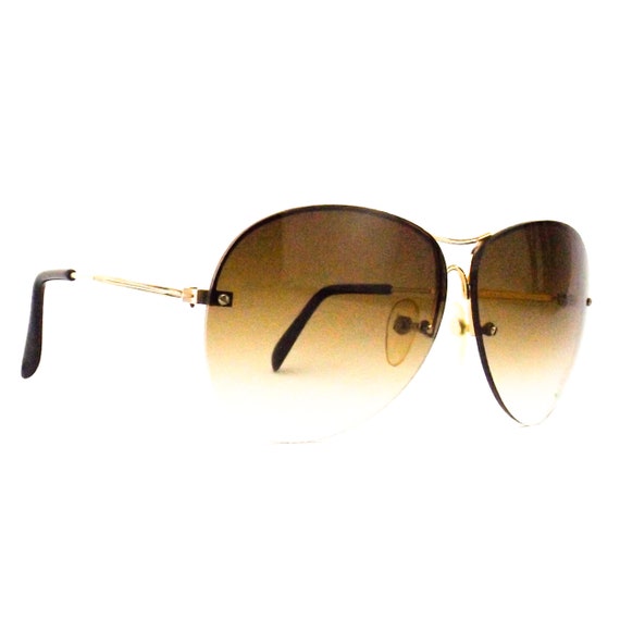 1980s vintage sunglasses womens round rimless sung