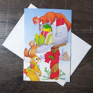animali biglietto di natale scoiattolo tamia coniglio cassetta postale regalo regali scena invernale paesaggio innevato biglietto di auguri amico/collega/madre