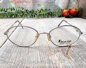 Montures de lunettes rondes vintage en argent mat : mode unisexe des années 90