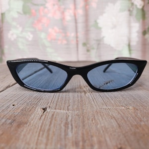 pointy cat-eye sunglasses 1990s fashion accessories blue color tinted lenses deadstock vintage eyewear 90s sunglass women/teen/tween/girl