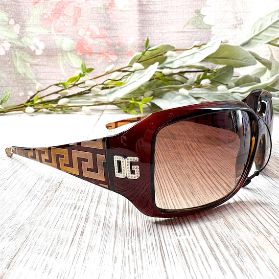 Tortoise-Shell Wrap-Around Sunglasses - image 1