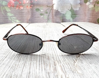 Gafas de sol vintage con montura metálica: protección UV unisex en color cobre