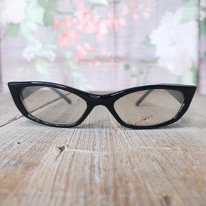 slim pointy cat-eye sunglasses black frames tinted lenses deadstock vintage fashion accessories eyewear women/teen/girl 1990s 90s sunglass