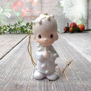 Delightful Christmas precious moments  ornament little boy string of lights retired 15849 original box bisque porcelain collectible decor