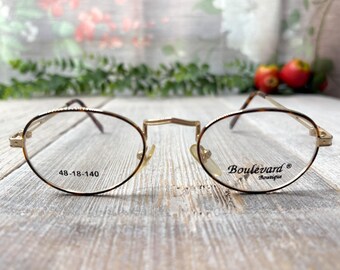 Monturas de gafas ovaladas vintage: color dorado claro con efecto carey, unisex, años 90, nuevas sin usar.