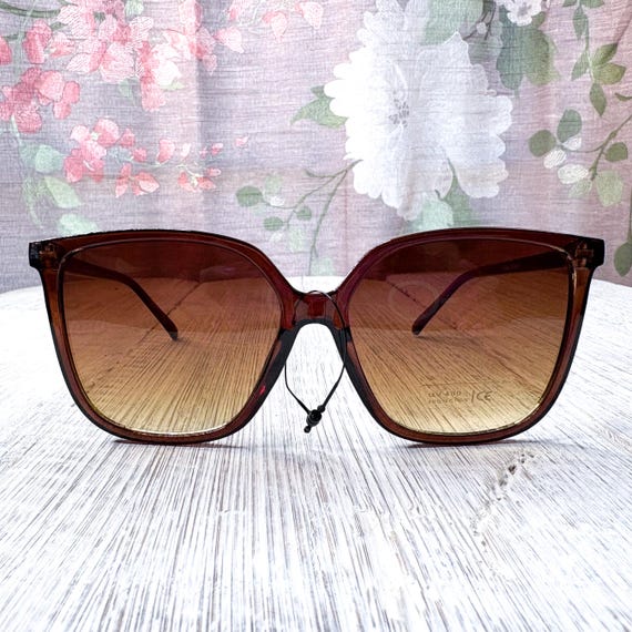 Oversized Cat-eye Sunglasses: Clear Brown Vintage Women display picture 1