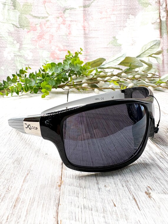 Oversized Wrap-Around Sunglasses: Black and Silver Plastic Frames