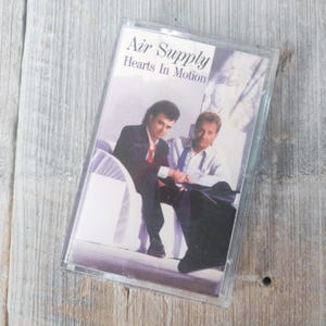 1986 cassette tape AIR SUPPLY Hearts in Motion, Arista Records 1980s soft rock band music