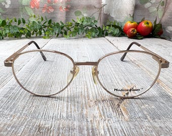 Nikon Wave WA 7439 0212, Vintage 90s Antique Gold Small Round