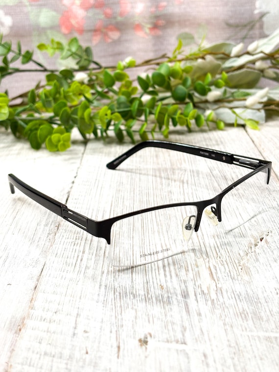 Black Rectangular Semi-Rimless Eyeglasses: 54[]17… - image 1
