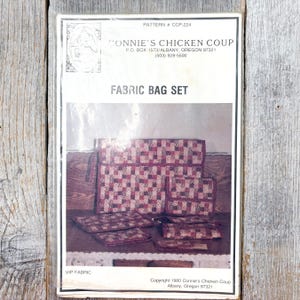 sewing pattern fabric bag set attaché, wallet, coin purse, checkbook, pouch, pattern is uncut