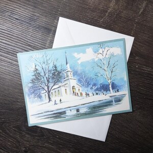 kerstkaart wit kerk sneeuw tafereel winter blauw en wit wenskaart nieuw oude voorraad ongebruikt vintage vakantie wonderbaarlijk wonder religieus