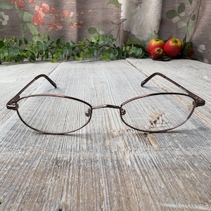 bronze tortoiseshell frames only oval eyeglasses 1990s prescription glasses fashion accessories unisex/men/women eyewear fashion accessory