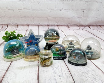 vintage souvenir snow globes, your choice