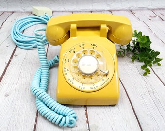 vintage ITT rotary phone telephone landline yellow blue