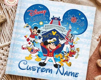 May include: A light blue Disney Cruise photo album with Mickey Mouse and friends. The cover features the words "Disney Cruise" and "Custom Name" in blue. The album has a nautical theme with a cruise ship illustration and the year 2020.
