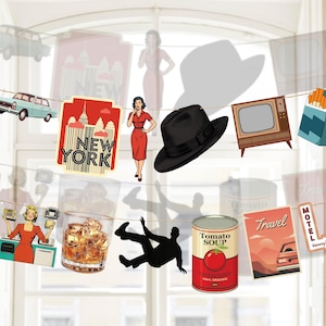 May include: A string of retro-themed cutouts and illustrations, featuring a black fedora, a vintage television, a can of tomato soup, and a New York City sign. The items are suspended on a line, forming a decorative arrangement.