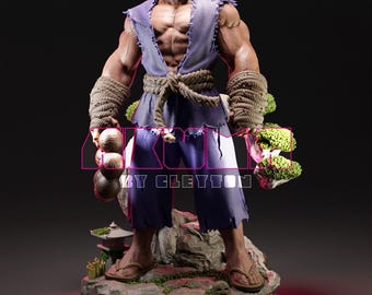 May include: A detailed figurine of a muscular character in a purple gi, with red hair and a stern expression. The figure is holding prayer beads and stands on a rocky base with miniature trees and a small pagoda. The text "BY CLEYTON" is visible.