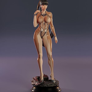 May include: A detailed figurine of a woman in a form-fitting outfit. The figure is posed on a black base with a textured design. The outfit is a combination of tan and brown tones, with intricate detailing. The woman is wearing high heels.