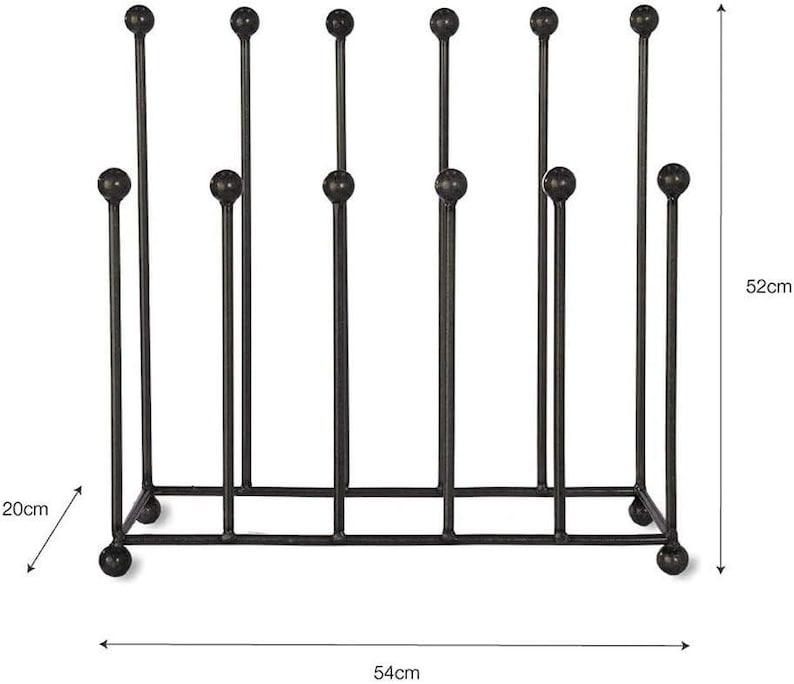 May include: A black metal boot rack with a rectangular base and vertical supports topped with decorative spheres. The rack is 20cm deep, 54cm wide, and 52cm tall, designed to hold multiple pairs of boots.
