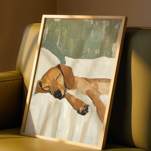 A brown dachsund sleeping on a white bed with a soft green background