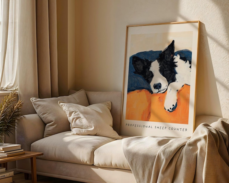 Border Collie art print in neutral living room above beige sofa – cozy dog-themed home decor.