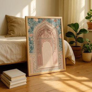 May include: Framed art print featuring an ornate archway design in soft pastel colors. The artwork showcases intricate floral patterns and architectural details, framed in natural wood. The print evokes a sense of cultural heritage and artistic expression.
