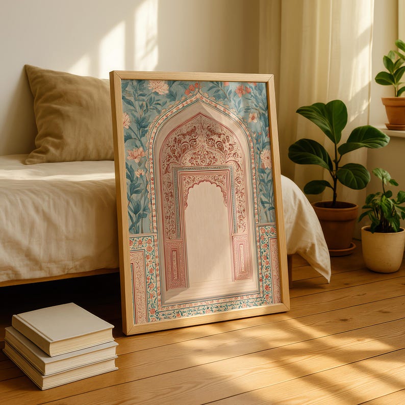 May include: Framed art print featuring an ornate archway design in soft pastel colors. The artwork showcases intricate floral patterns and architectural details, framed in natural wood. The print evokes a sense of cultural heritage and artistic expression.