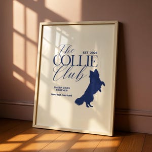 May include: A framed print with a cream background and a gold frame. The print features the text "The Collie Club" in a script font, with "EST 2026" above it. A blue silhouette of a collie dog is on the right, with the words "Sheep Dogs Forever" and "Herd fast, nap hard" below.