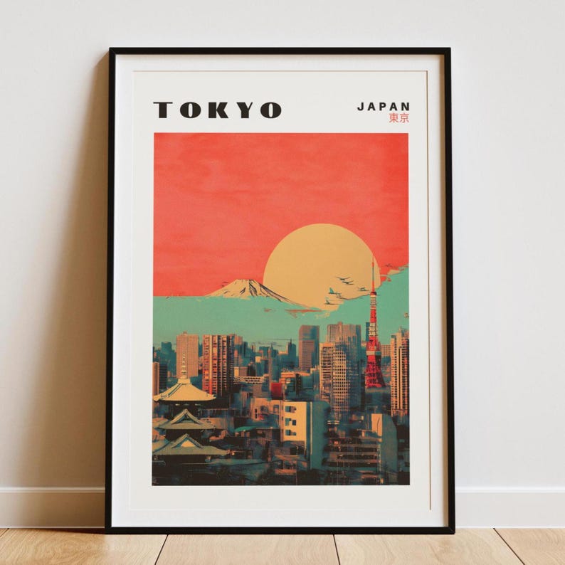 May include: A vintage-style poster with a red, orange, and yellow sunset over a cityscape. The poster says "TOKYO JAPAN 東京" in black text. The cityscape includes the Tokyo Skytree and Mount Fuji.