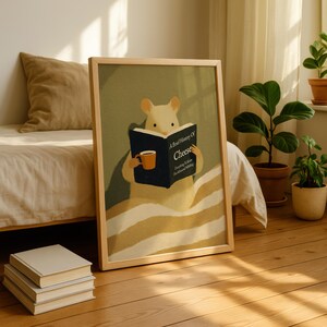 May include: A framed print shows a mouse reading a book titled "A Brief History Of Cheese." The mouse holds a mug. The artwork has a light wood frame and is set against a neutral background with a bed and plants.
