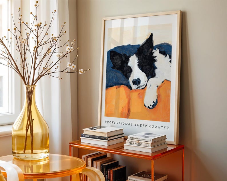 Border Collie dog illustration styled on wooden sideboard with vase and coffee table – minimalistic pet portrait wall art.