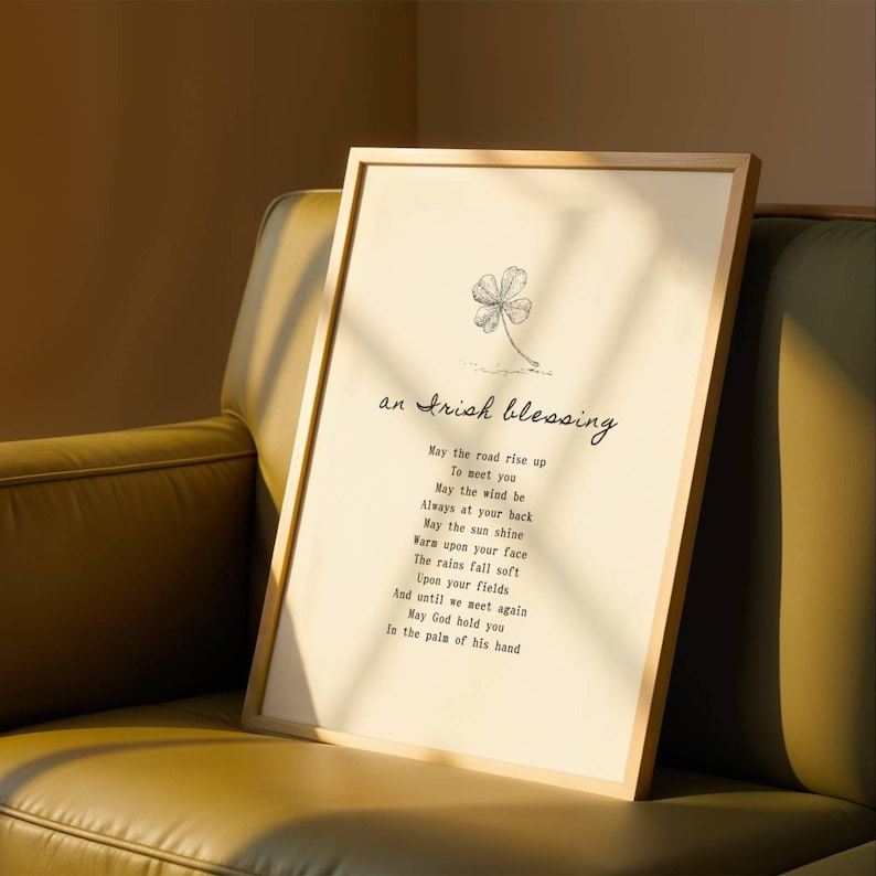 Religious quote print with shamrock detail on leather chair – Irish home blessing artwork with elegant type.