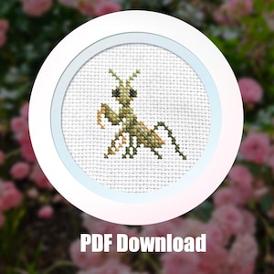 May include: A cross-stitch pattern of a green praying mantis on white fabric, presented in a circular frame. The text PRAYING MANTIS is displayed above the design, and the text PDF Download is positioned below the circular frame.