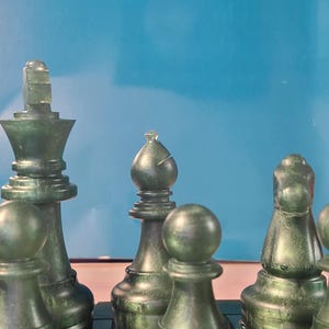 2 n 1 Chess/checkers set. Board with chess and checker pieces to play