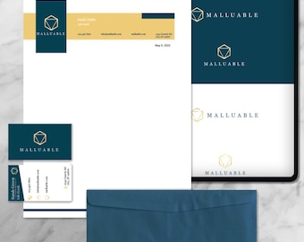 May include: A blue and gold business stationery set with a geometric logo. The logo is a gold outline of a cube with the word "MALLUABLE" in gold text below it. The stationery set includes a letterhead, business card, and envelope.