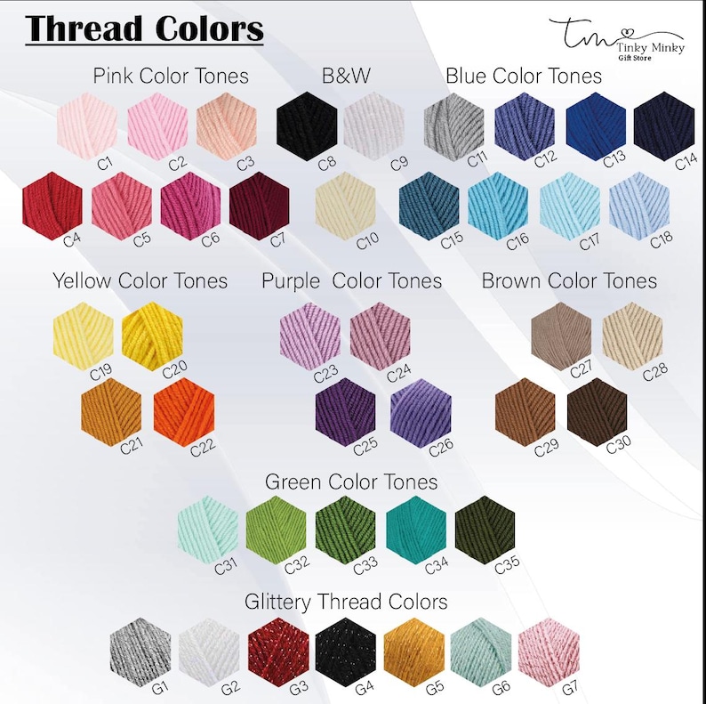 May include: A color chart titled "Thread Colors" displays various thread hues. The chart is organized into color families: Pink, B&W, Blue, Yellow, Purple, Brown, Green, and Glittery. Each color is represented by a hexagonal shape with a corresponding code.