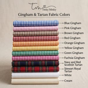 May include: A stack of folded fabric swatches labeled Tinky Minky Gingham & Tartan Fabric Colors. The stack includes blue, pink, brown, red, orange, yellow, green, and fuchsia gingham patterns, followed by navy and red Scottish tartan, Stewart Royal tartan, white, and cream solid fabrics.
