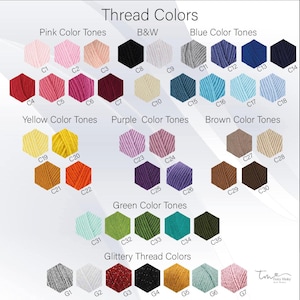 May include: A chart of thread colors organized by color family. The chart includes pink, black and white, blue, yellow, purple, brown, green, and glittery thread colors. Each color is labeled with a number.